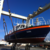 В Алексино порт Марина  Shipyard вышел после аварийного ремонта лоцмейстерский катер Бора
